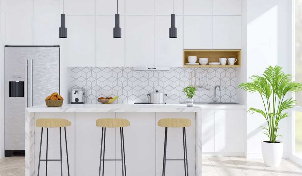 upstands, plant vase and sink in the white kitchen