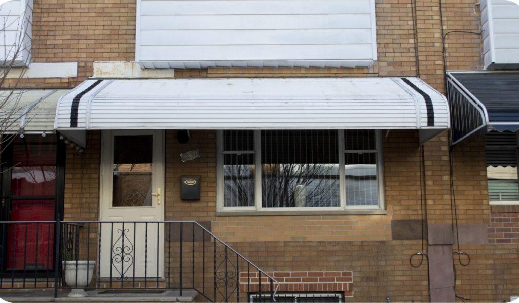 porch awnings are installed infront of porch