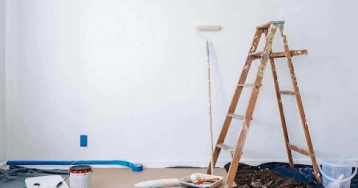 A wooden leather near the painting materials