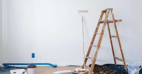 A wooden leather near the painting materials